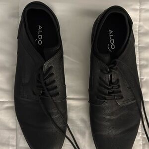 One pair of men’s dress shoes.